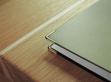 4 gold metal book corners